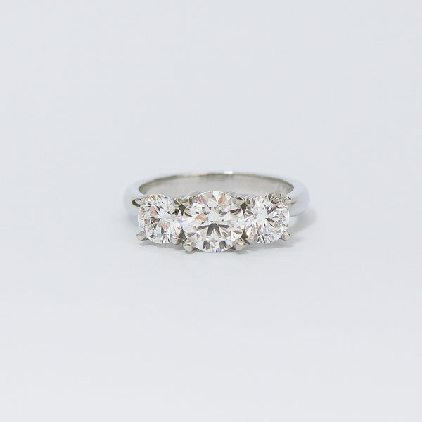 Charm 3 stone diamond ring.