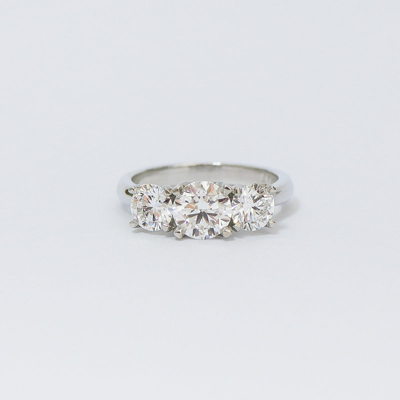 Charm 3 stone diamond ring.