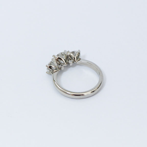 Charm 3 stone diamond ring.