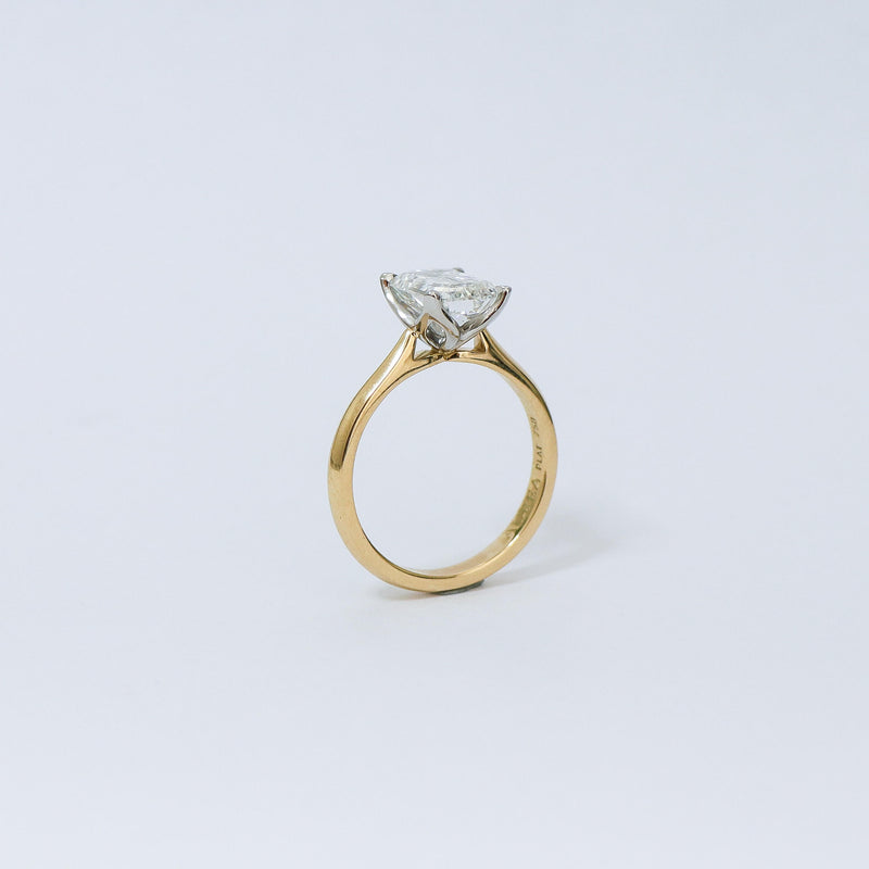 Emerald cut Fleur solitaire. Side view.