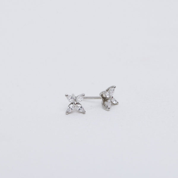 Small diamond flower stud earrings.