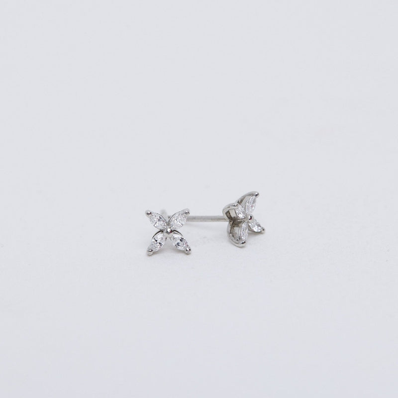 Small diamond flower stud earrings.