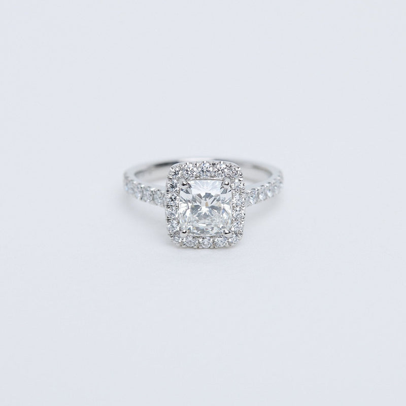 Cushion diamond halo ring.