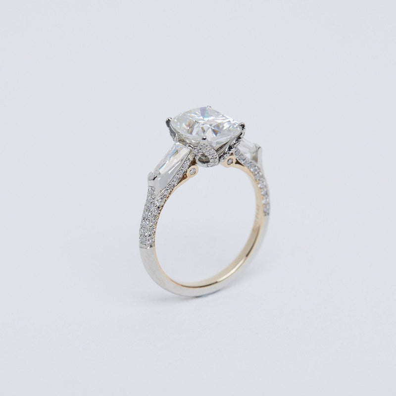 3 carat elongated cushion diamond with tapered bullet side diamonds and fine diamond detailing