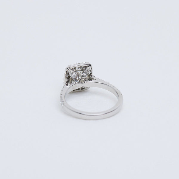 Cushion cut diamond halo ring flower detailing