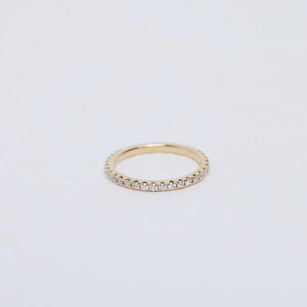 Fine diamond split claw ring 18ct yellow gold